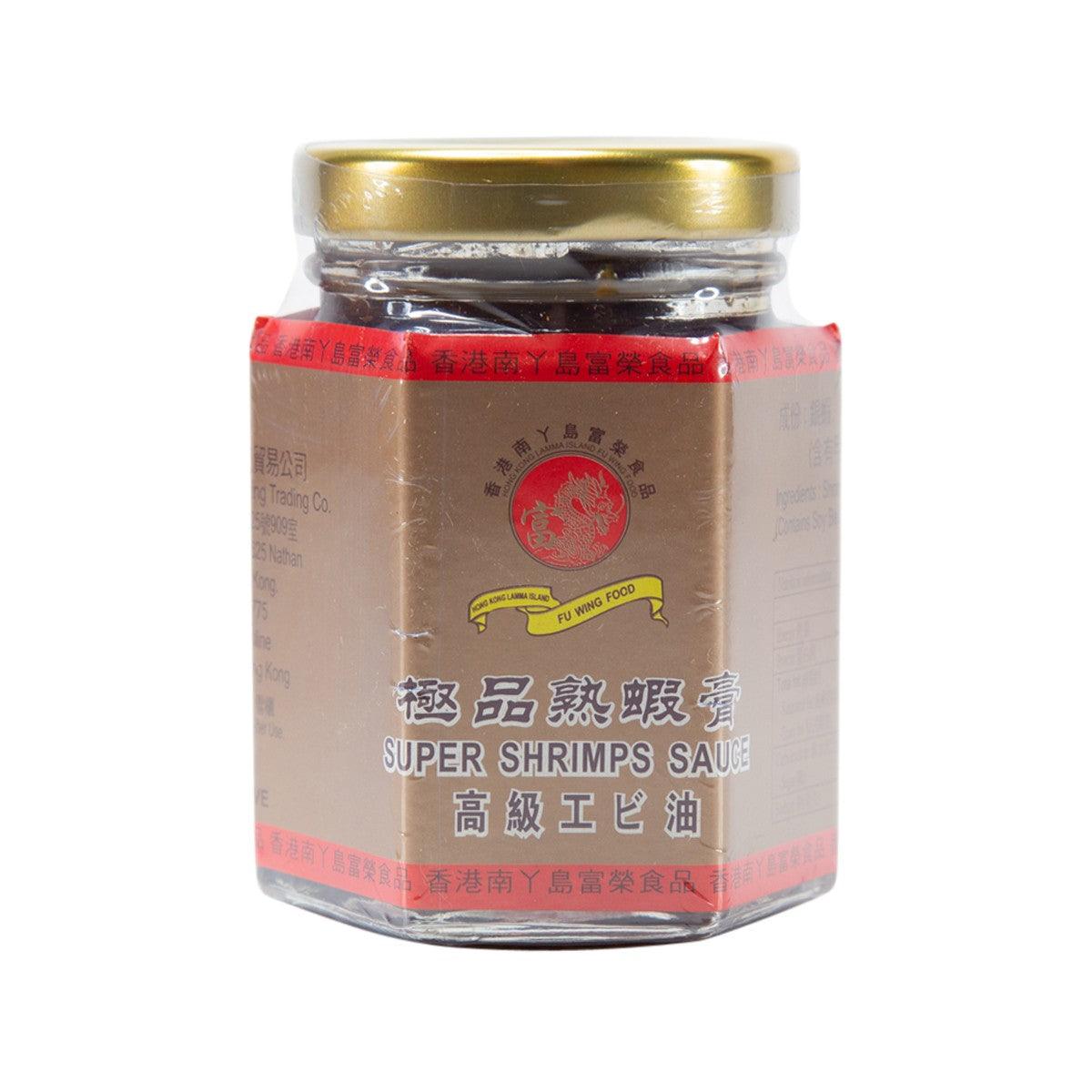 Shrimp sauce jar with gold lid and beige label, red branding band.