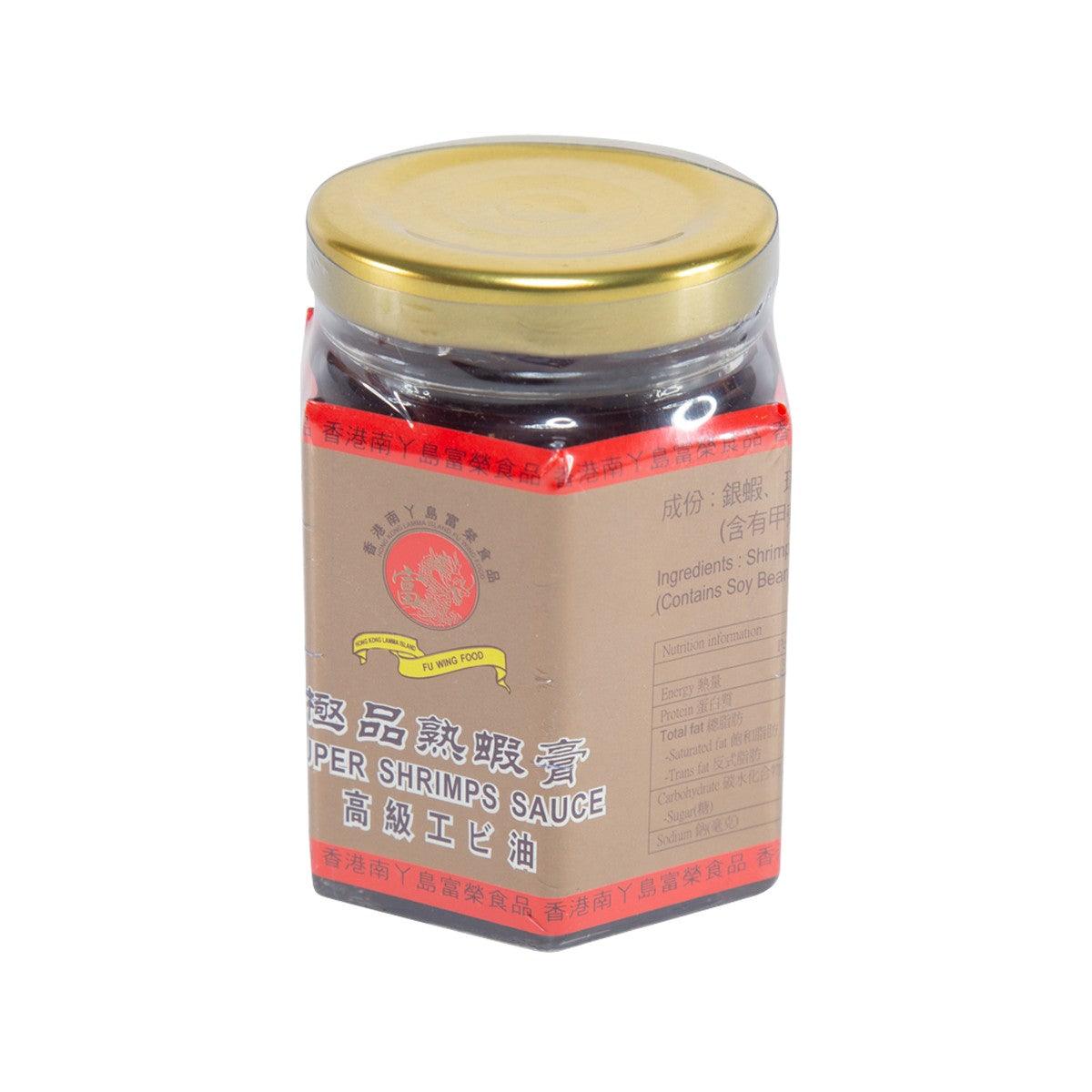Shrimp sauce jar front view with gold lid, beige label and red stripe.