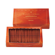 Baton cookies gift box with dark brown biscuit sticks, open tray with 25 pieces