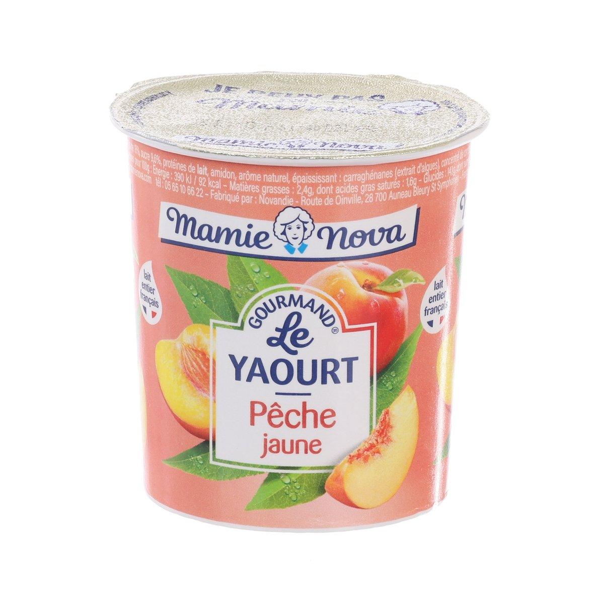 Mamie Nova peach yogurt cup, 150 g, with foil lid and fruit illustration.