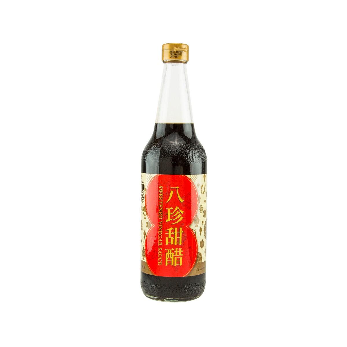 Bottle of sweetened vinegar sauce with gold cap and front label