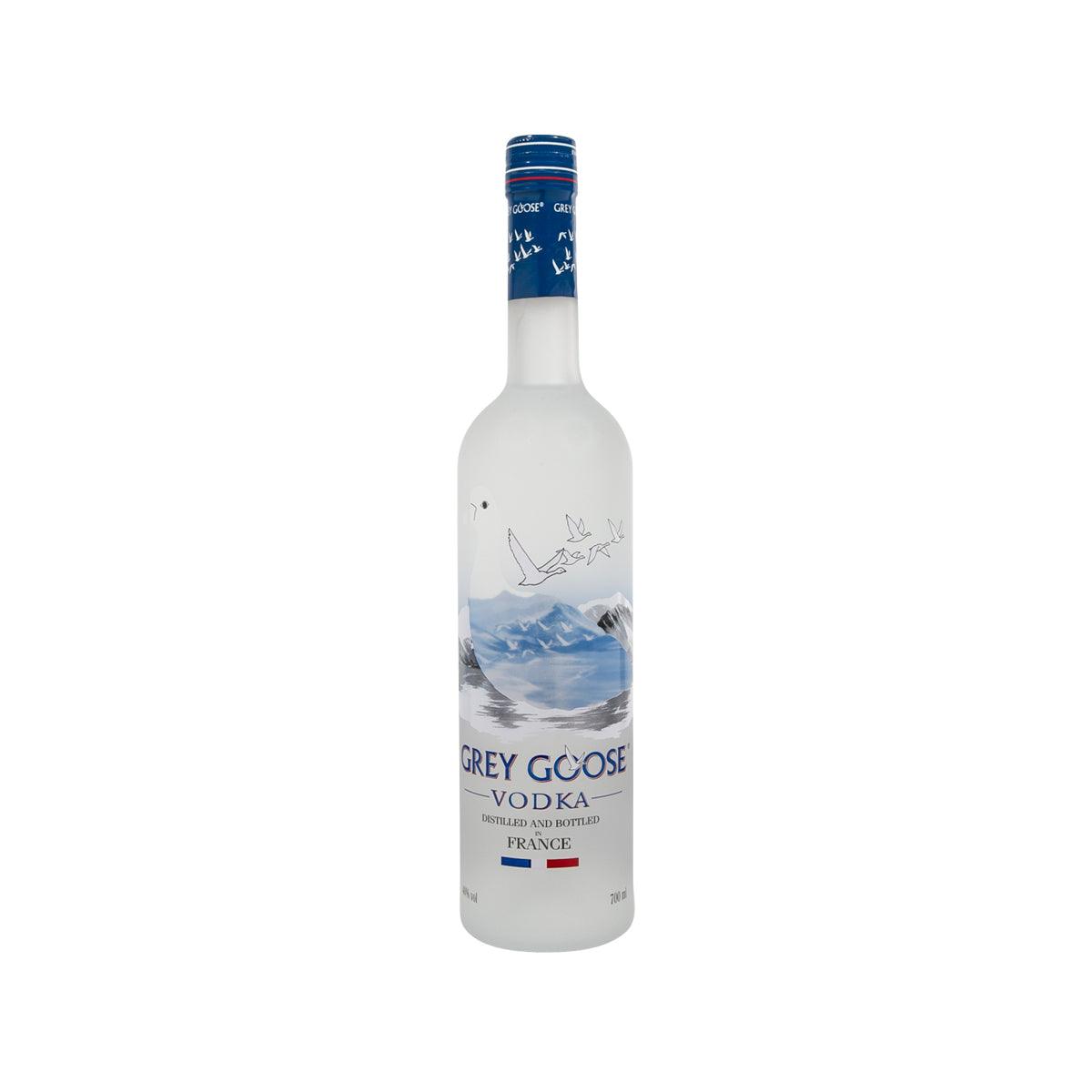 Grey Goose vodka bottle with blue cap and white label