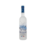 Grey Goose vodka bottle with blue cap and white label