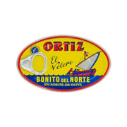 ORTIZ bonito del norte tuna can in olive oil, yellow front label with sailboat