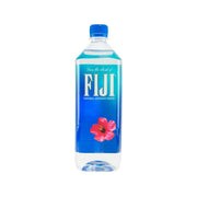 FIJI natural artesian water 1L bottle with blue cap and hibiscus graphic.