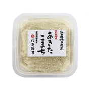 Packaged Akita Komachi rice in clear plastic tray with printed label