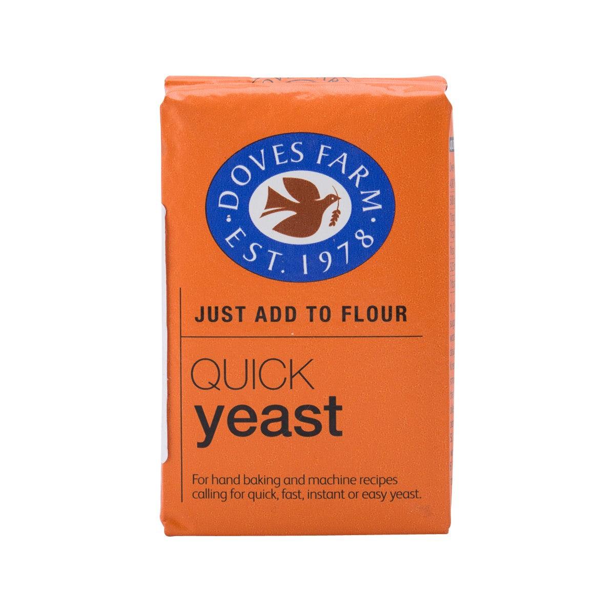 Doves Farm quick yeast, orange pouch with front label reading “Just add to flour”