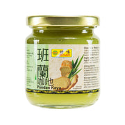 Green pandan kaya spread in glass jar with gold lid, front label visible