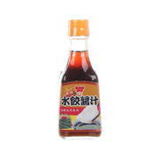 Dumpling hot sauce bottle with orange cap and dark red liquid, front label