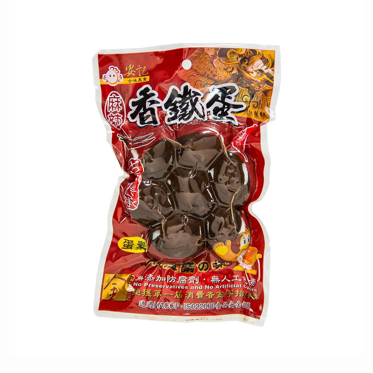 Hot & spicy preserved eggs pouch, red package with dark egg filling window