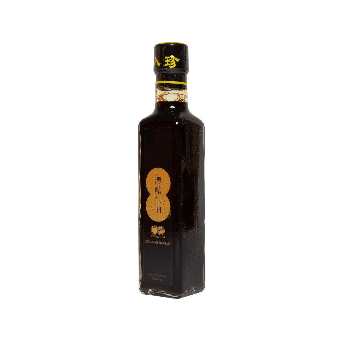 Soy sauce bottle with dark glass and gold label, PAT CHUN, slim square shape
