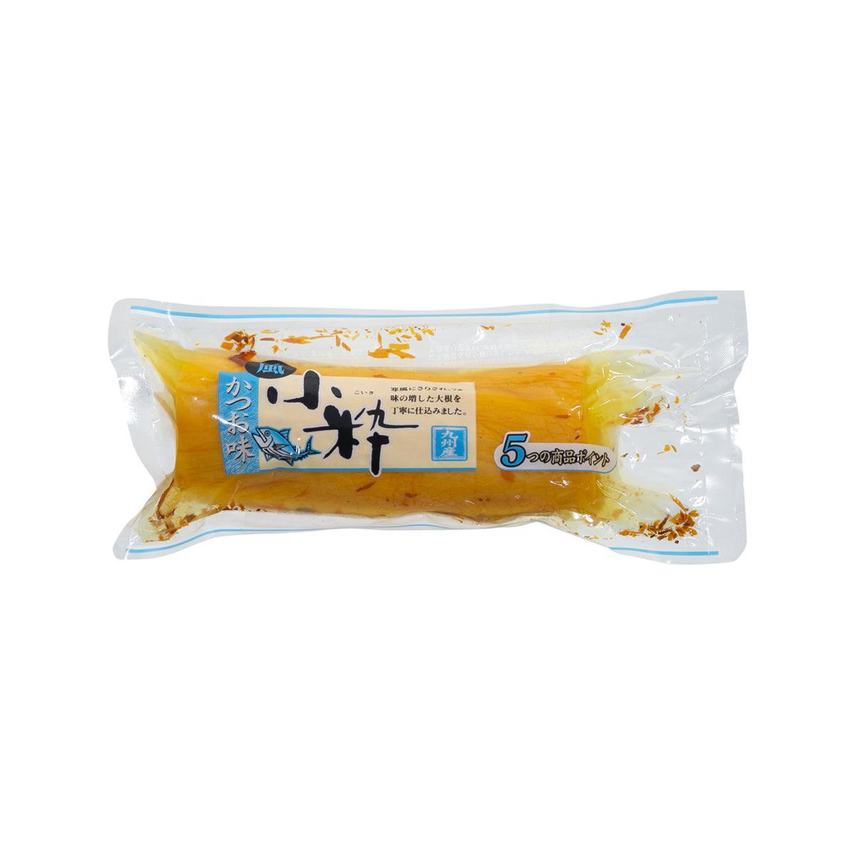 Packaged bonito pickled radish with yellow radish pieces in a clear plastic pouch.