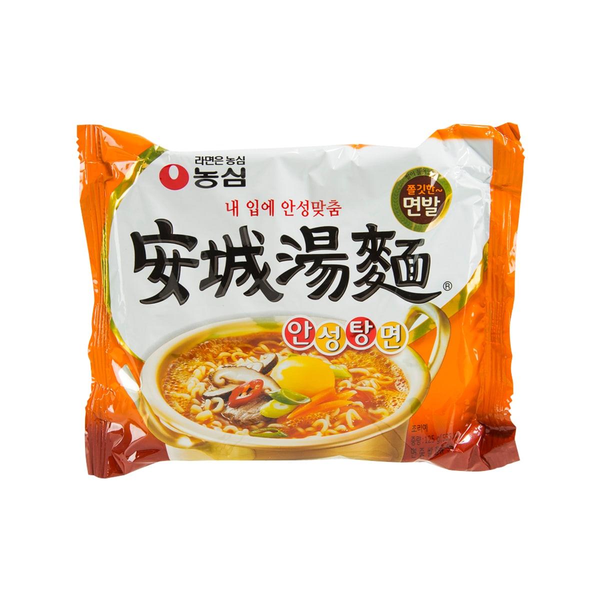 Instant noodle soup packet, orange-and-white bag with front label