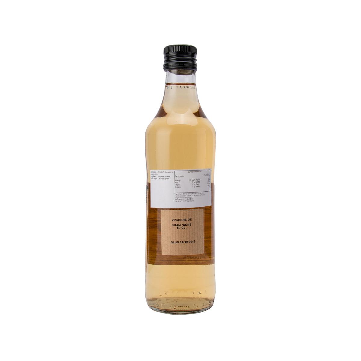 LE BLANC champagne vinegar, back label on amber bottle, black cap, 500 mL