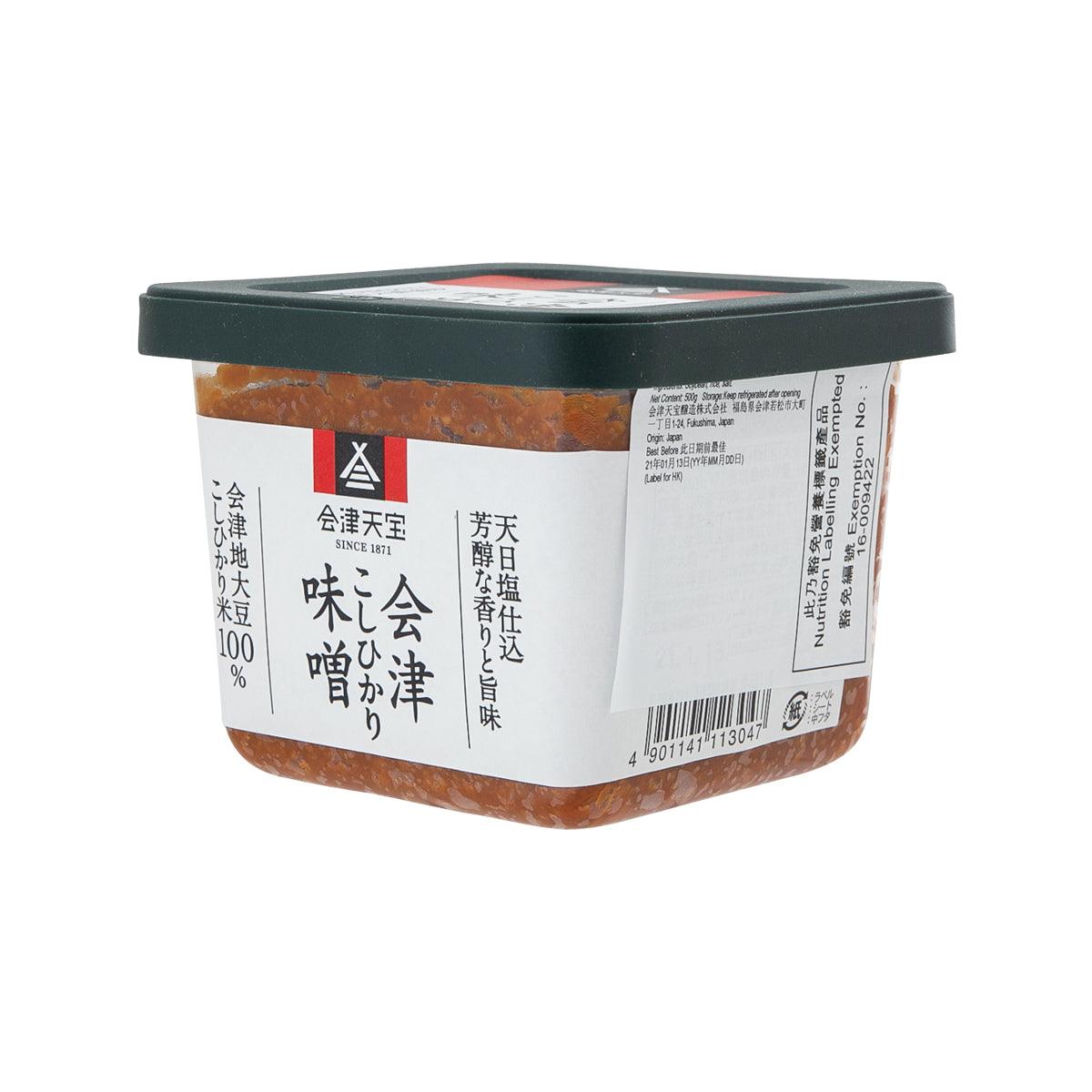 Rice miso paste jar with dark lid, white side label and brown-orange contents