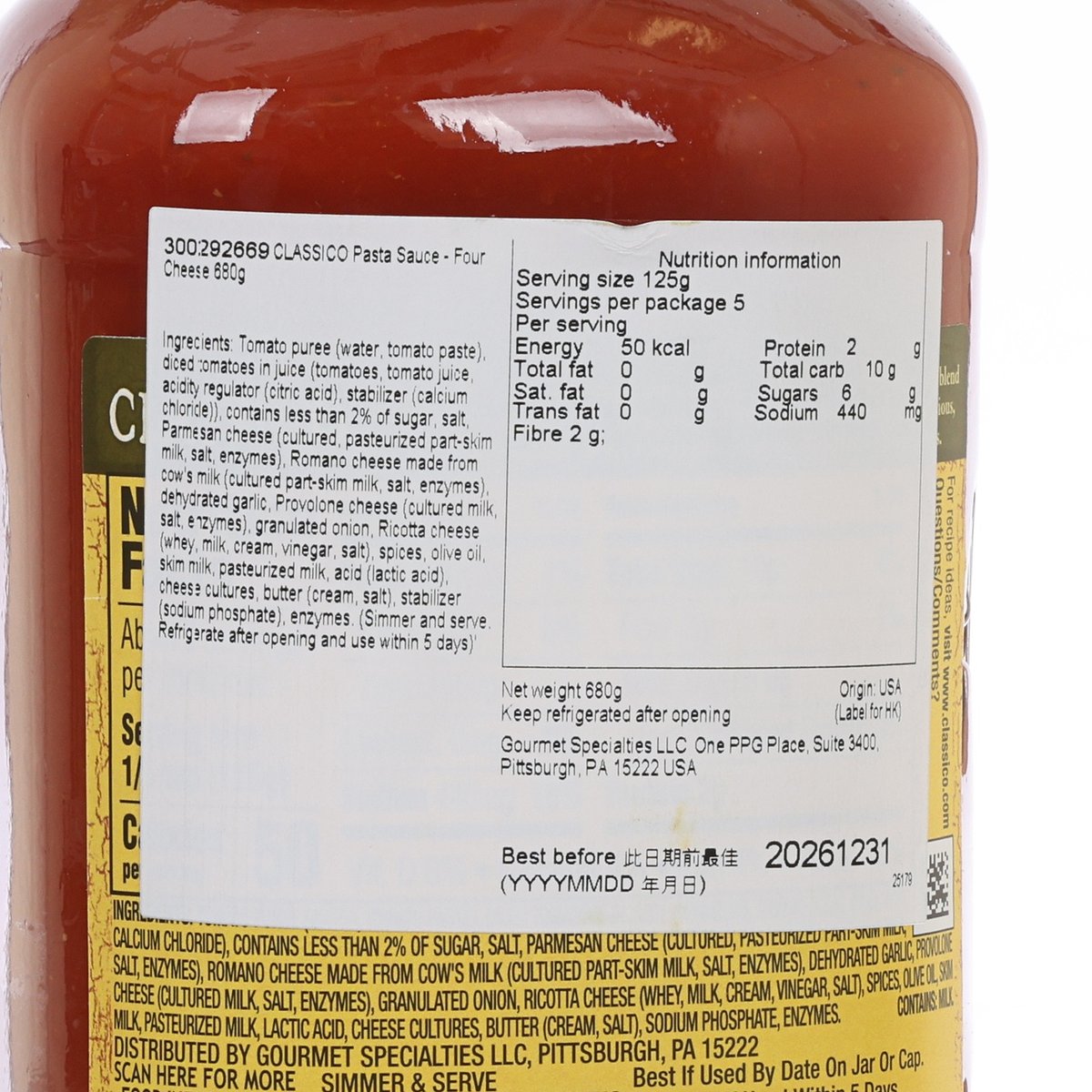 CLASSICO four-cheese pasta sauce label close-up, nutrition facts on jar