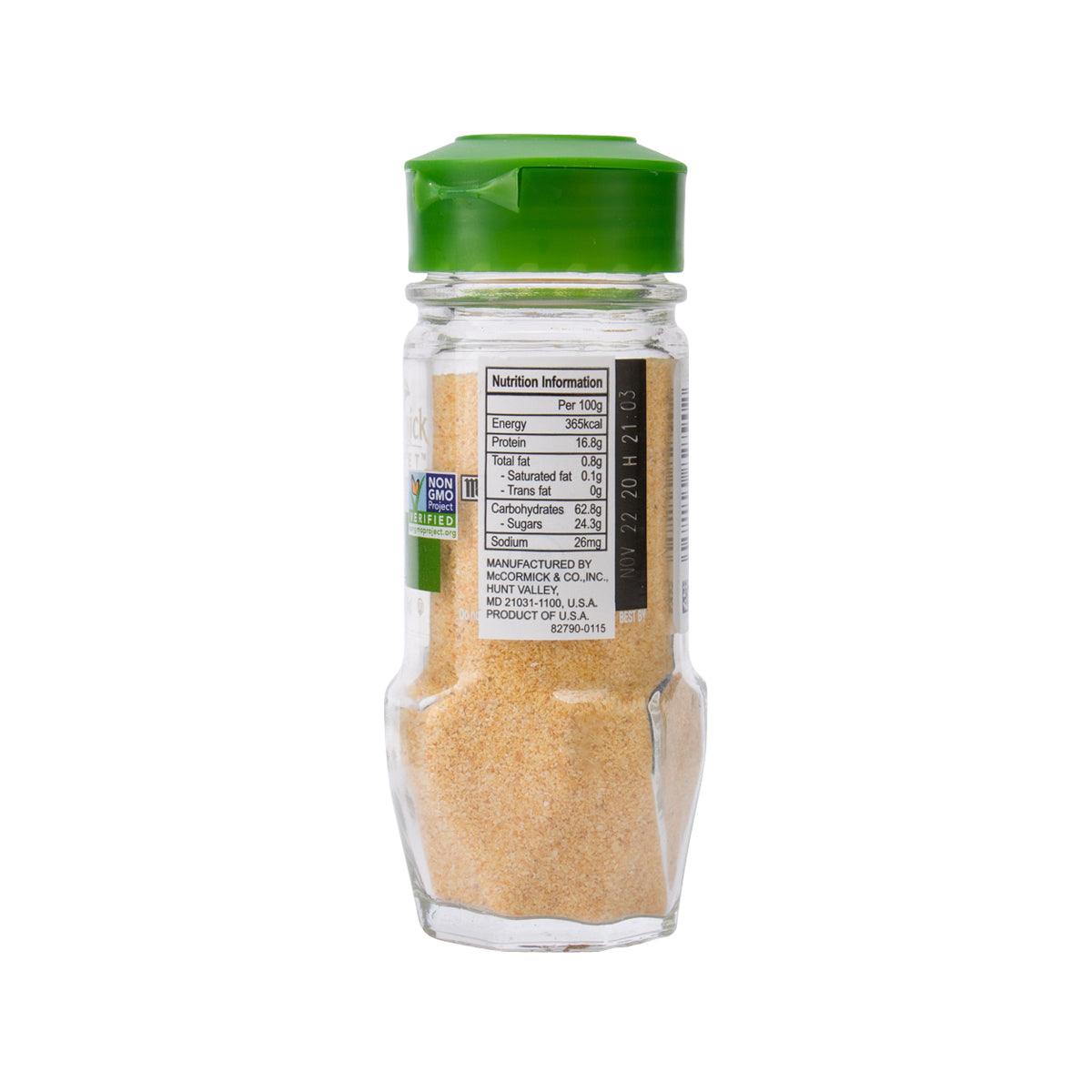 Organic garlic powder jar back label with nutrition facts and beige spice fill