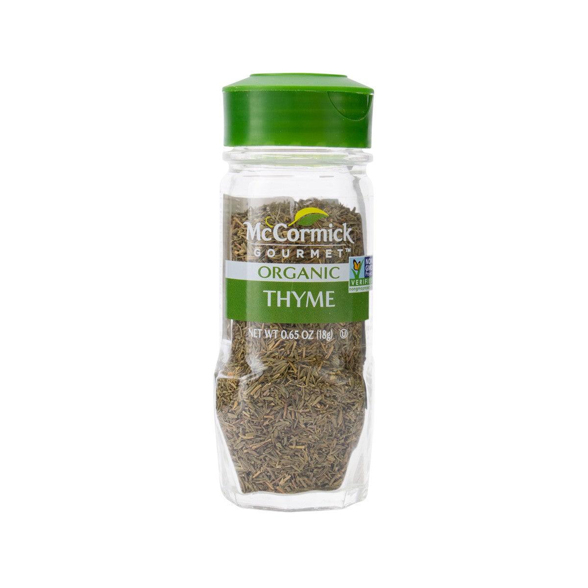 MCCORMICK Organic thyme jar with green lid and dried herb inside