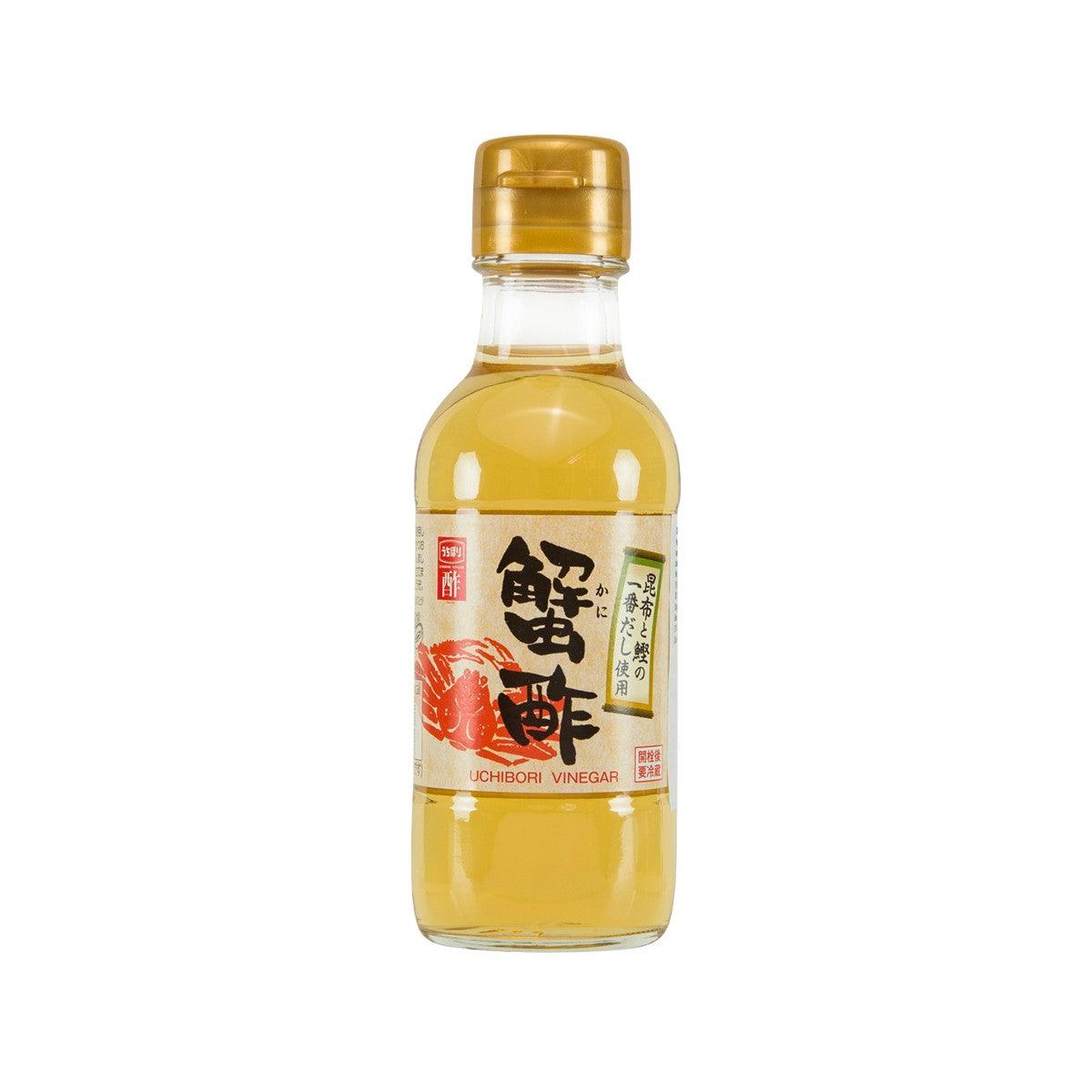 Blended vinegar bottle with gold cap, clear glass, amber liquid