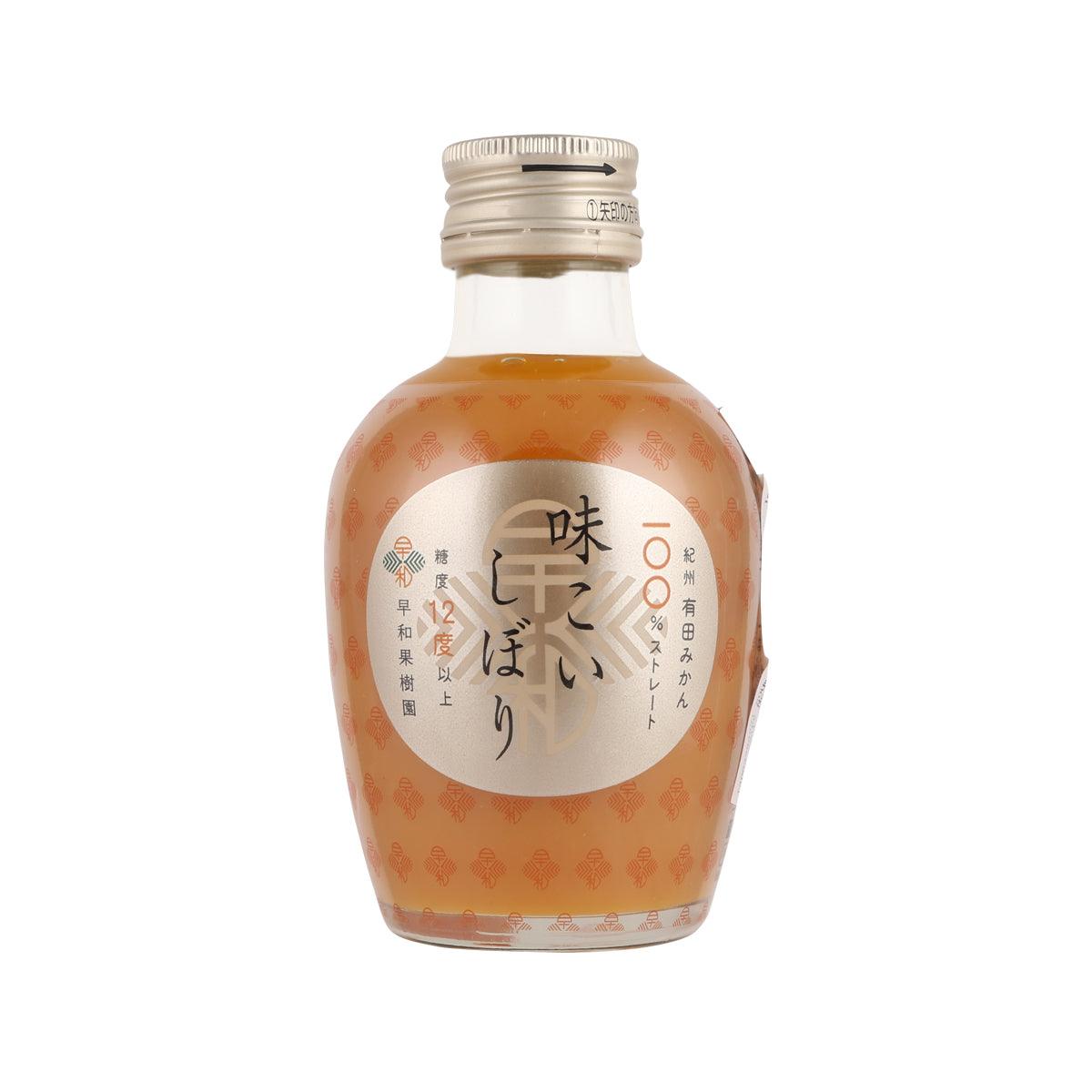 Mikan juice bottle with beige cap, amber orange liquid, Japanese label