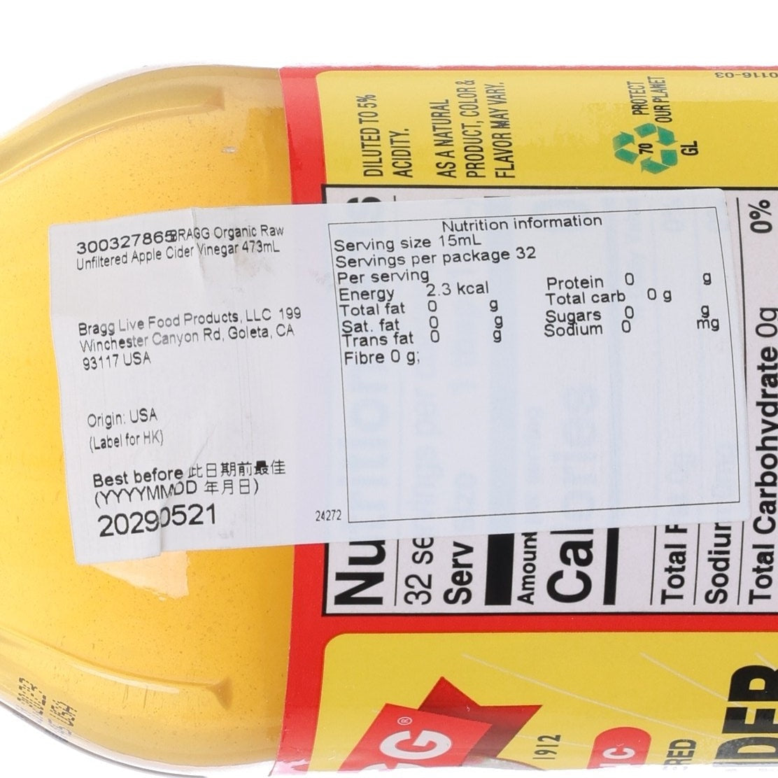Apple cider vinegar label close-up with nutrition facts on BRAGG 473 mL bottle