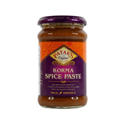 PATAK'S Korma spice paste jar with purple label and amber-brown contents