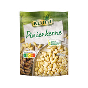 KLUTH raw pine kernels in green-and-white pouch, 100 g