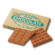 ROYCE' creamy milk chocolate bar with broken pieces and brown grid texture