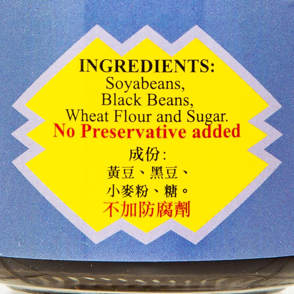 Black bean sauce label close-up showing ingredients: soybeans, black beans, wheat flour