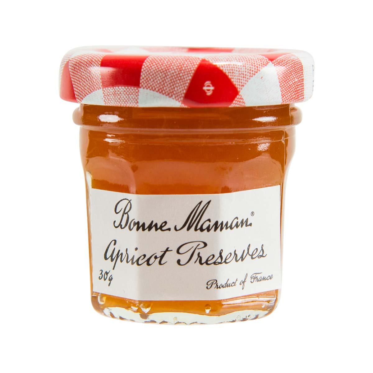 Apricot preserves jar with BONNE MAMAN front label and red-orange checked lid