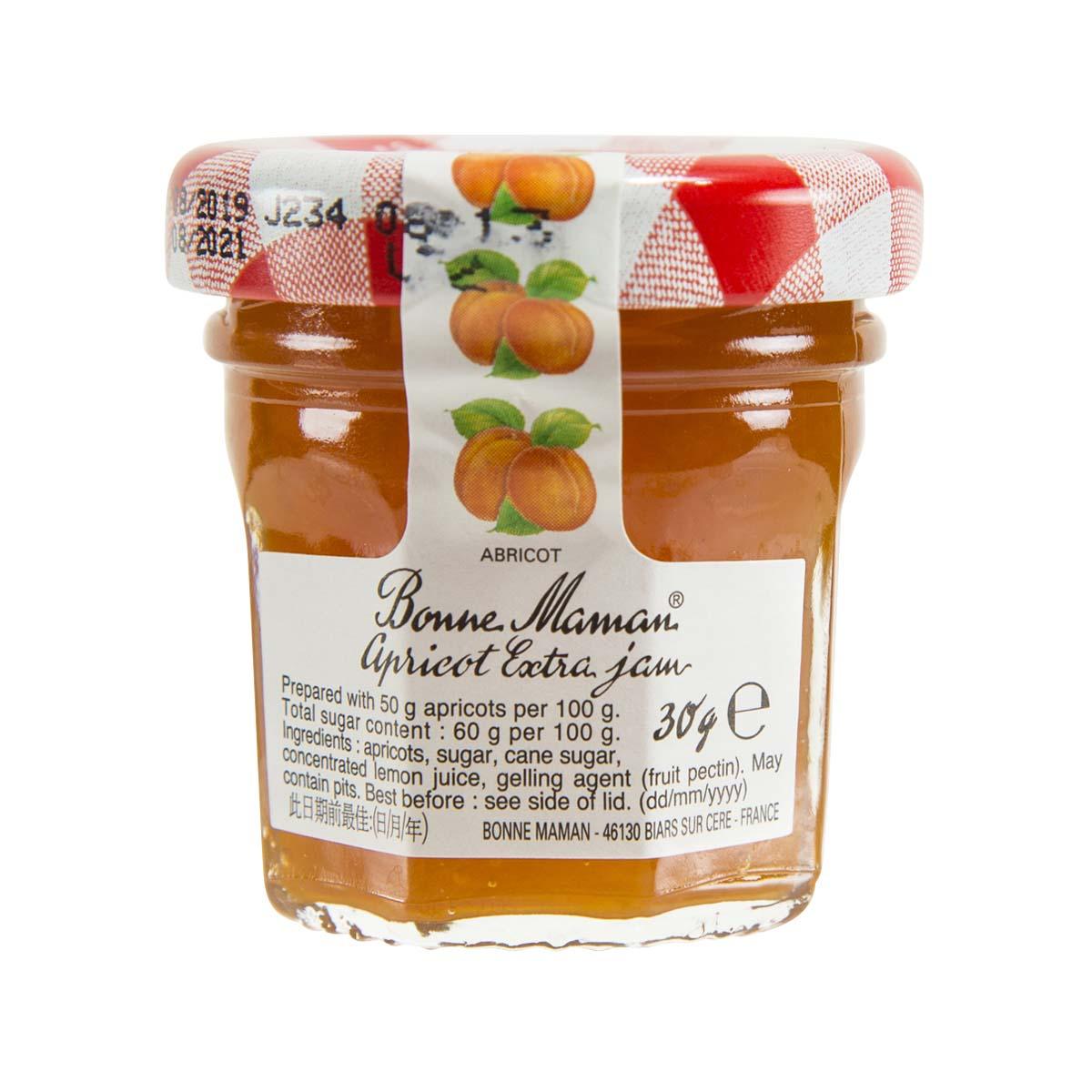 Apricot preserves jar with BONNE MAMAN back label and red-orange checked lid