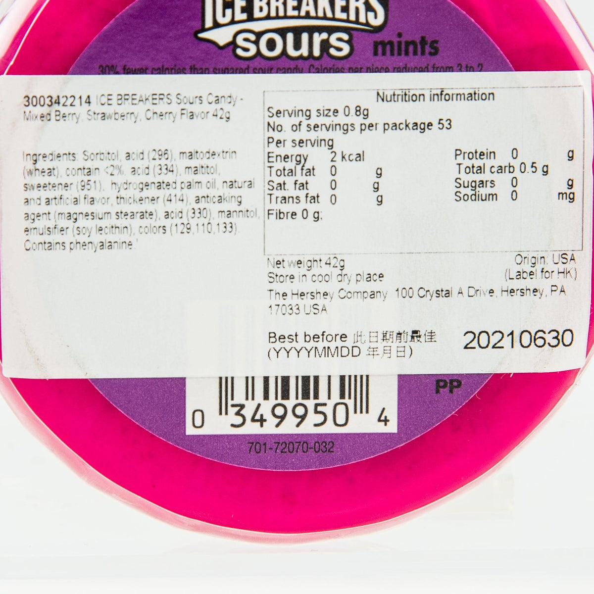 Sour candy tin back close-up with ingredients list, nutrition facts, barcode