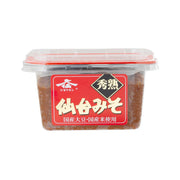 Tub of miso paste in clear plastic container with red label, 300 g
