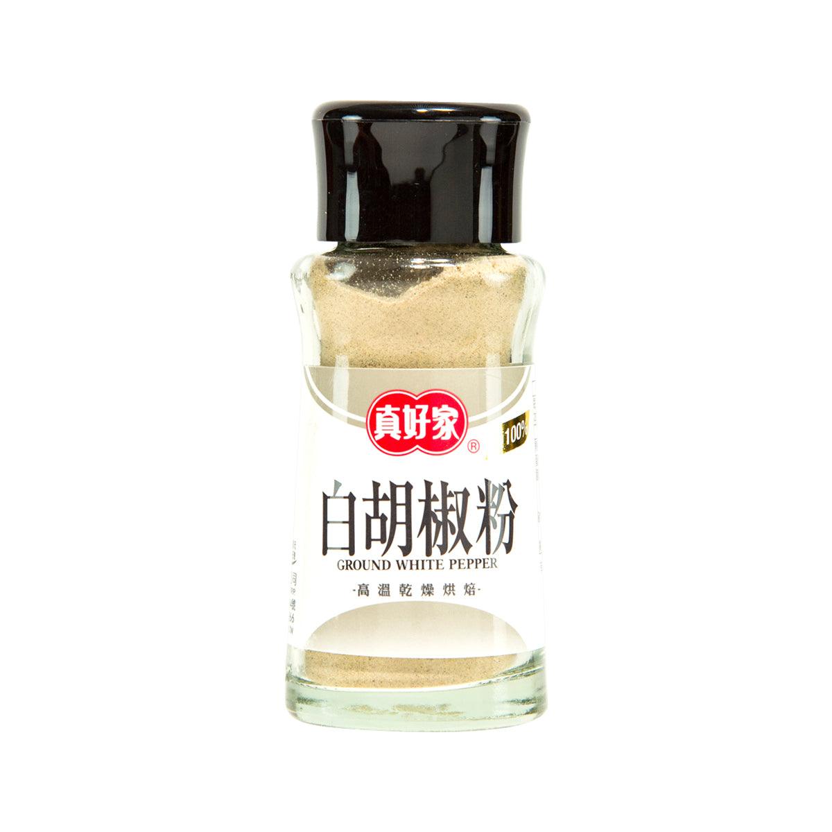 Ground white pepper jar, glass bottle with black cap, labeled 30g