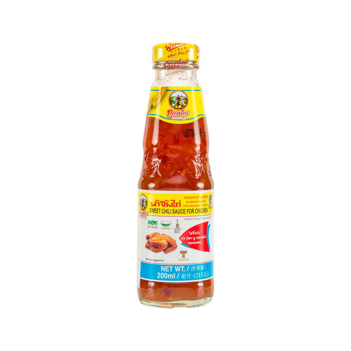 Sweet chili sauce bottle with red sauce and Pantai Norasingh label, 215g