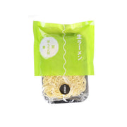 Fresh noodle pouch with green front and bundled pale noodles