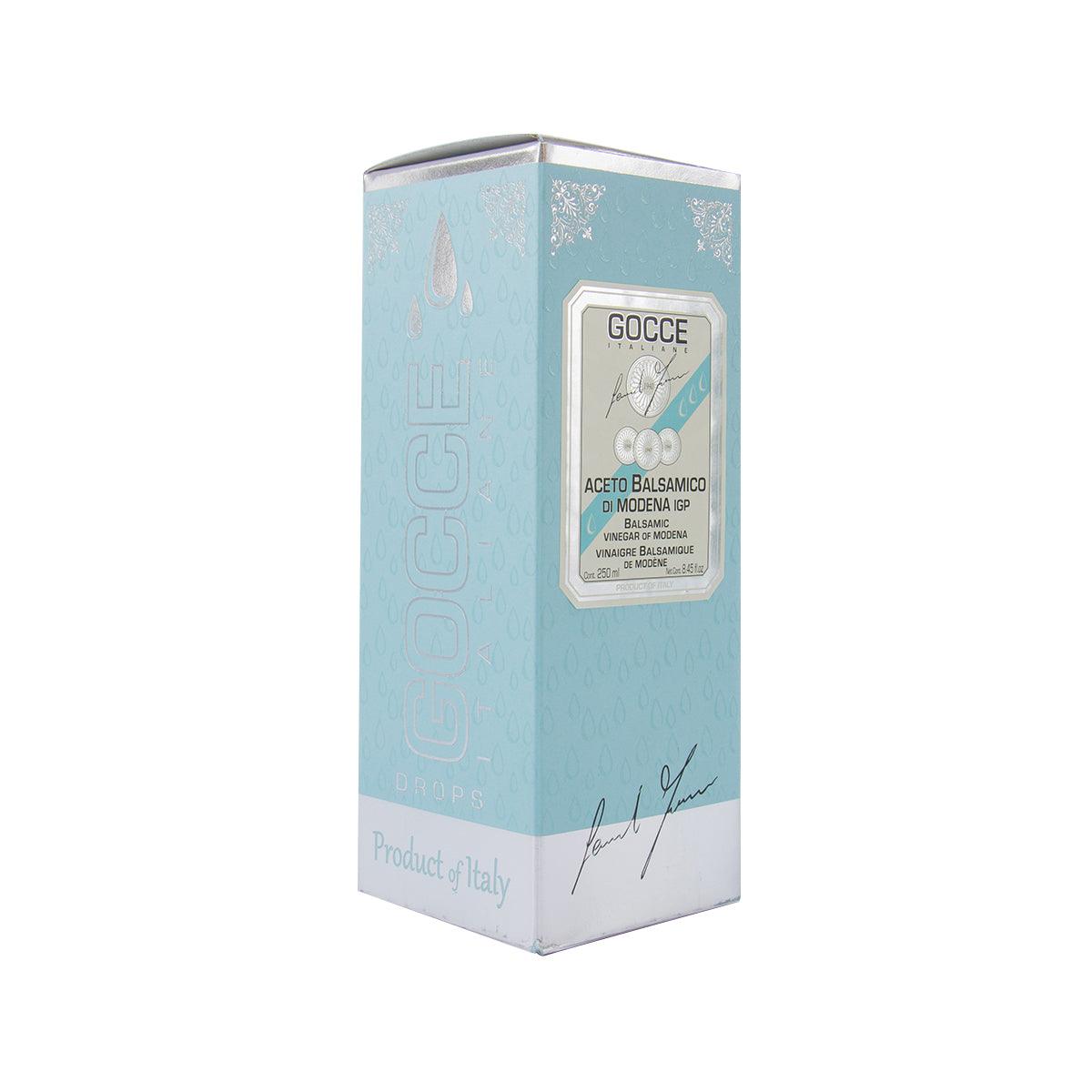 Balsamic vinegar carton box in light blue with GOCCE label and embossed droplets