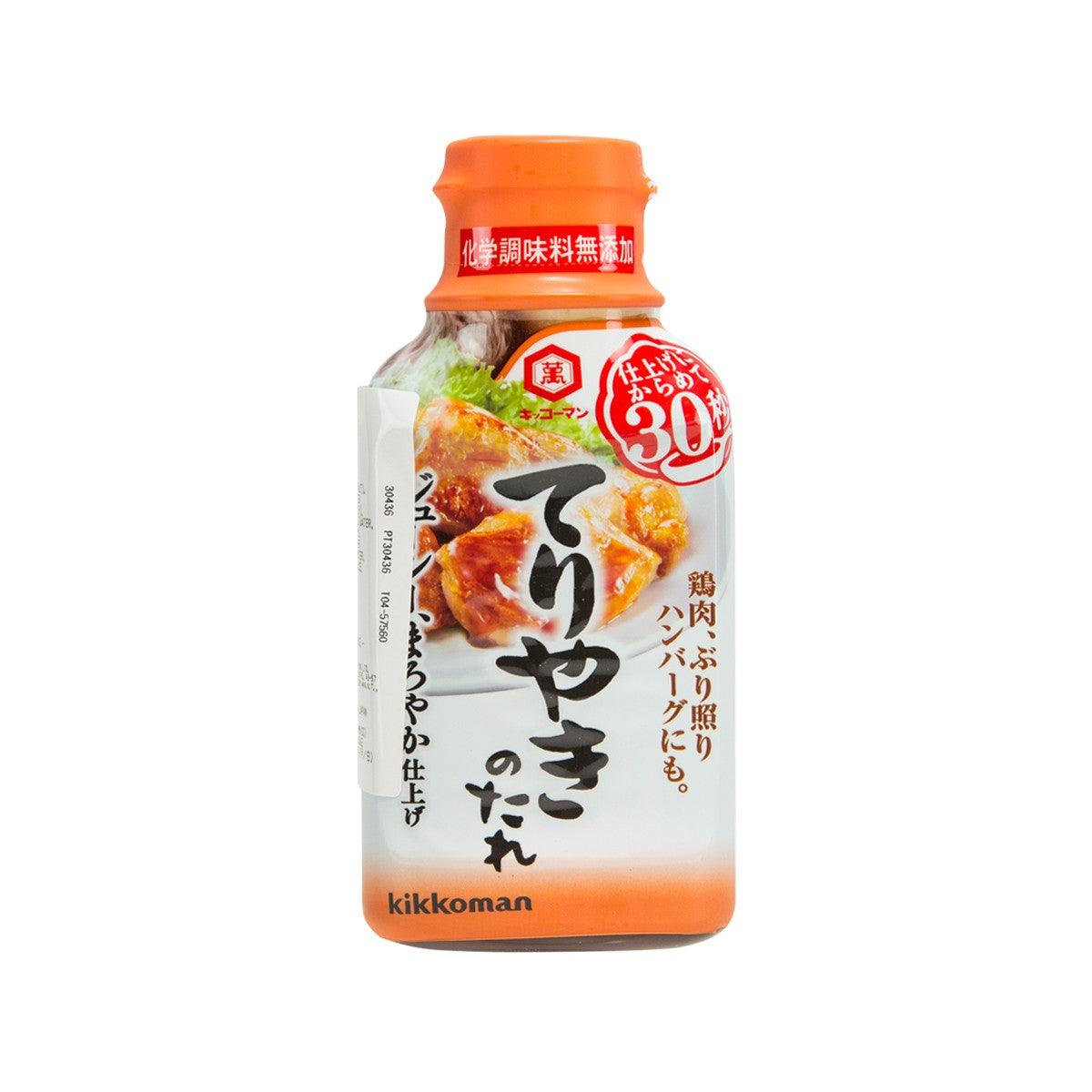 Kikkoman teriyaki sauce bottle with orange cap and printed label