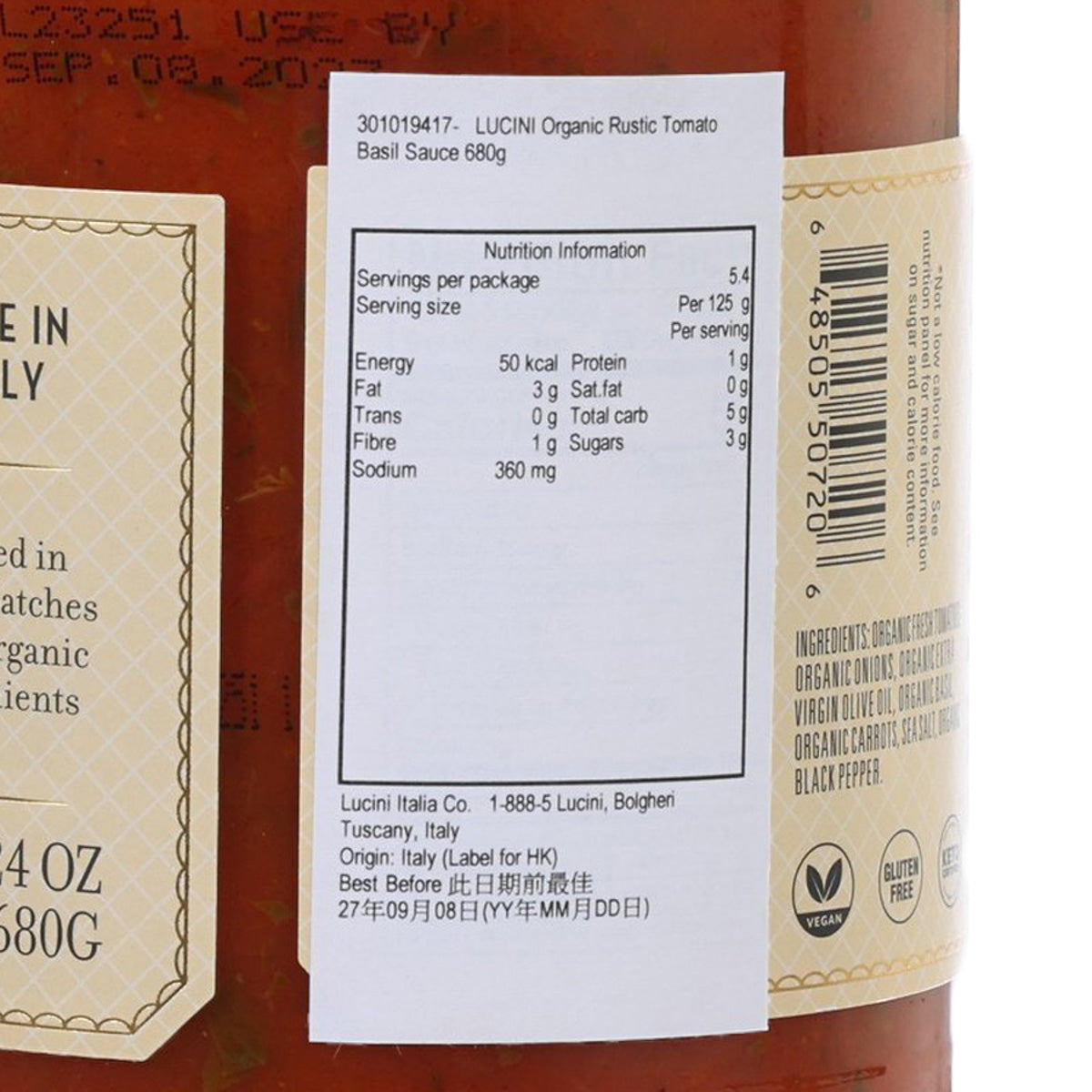 Rustic tomato basil sauce jar close-up of nutrition facts label