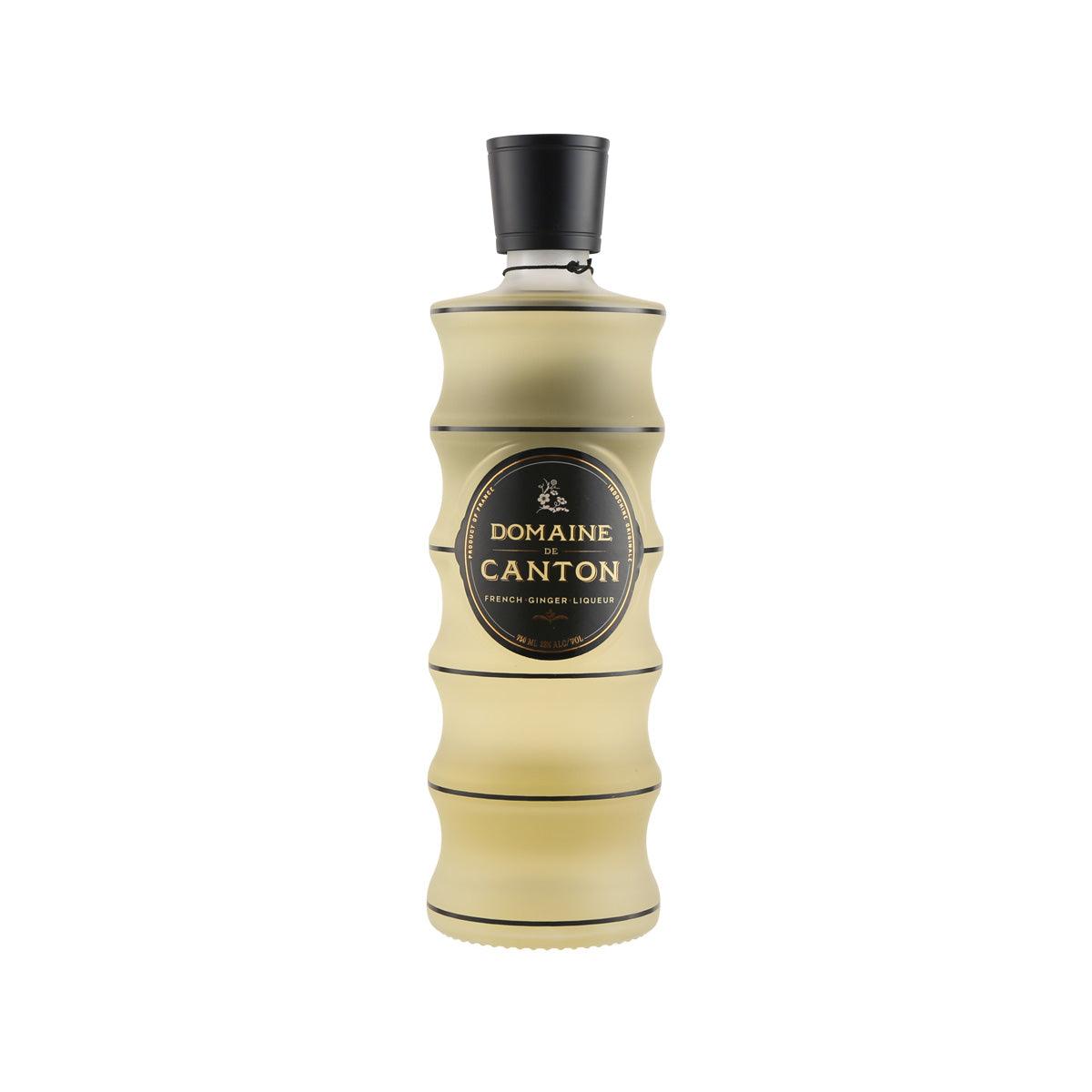 DOMAINE DE CANTON ginger liqueur bottle with black cap, amber label, 750 mL.