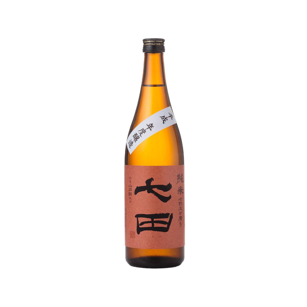 SHICHIDA Junmai sake bottle, amber glass with Japanese calligraphy label and dark cap