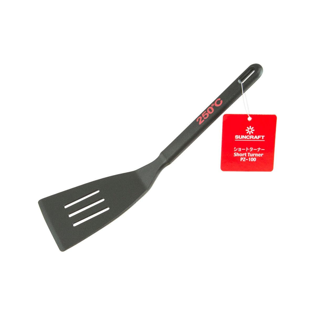 Short slotted turner, dark handle and head, with SUNCRAFT tag and 250°C