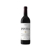 Wine bottle with dark glass and label reading PINTIA, vintage-style Toro text