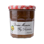 Glass jar of fig preserve with red gingham lid