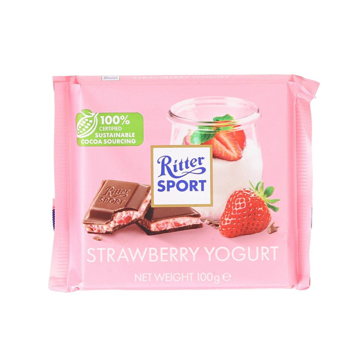 Strawberry yogurt milk chocolate bar pack, pink wrapper with strawberry and Ritter SPORT logo