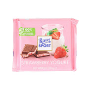 Strawberry yogurt milk chocolate bar pack, pink wrapper with strawberry and Ritter SPORT logo
