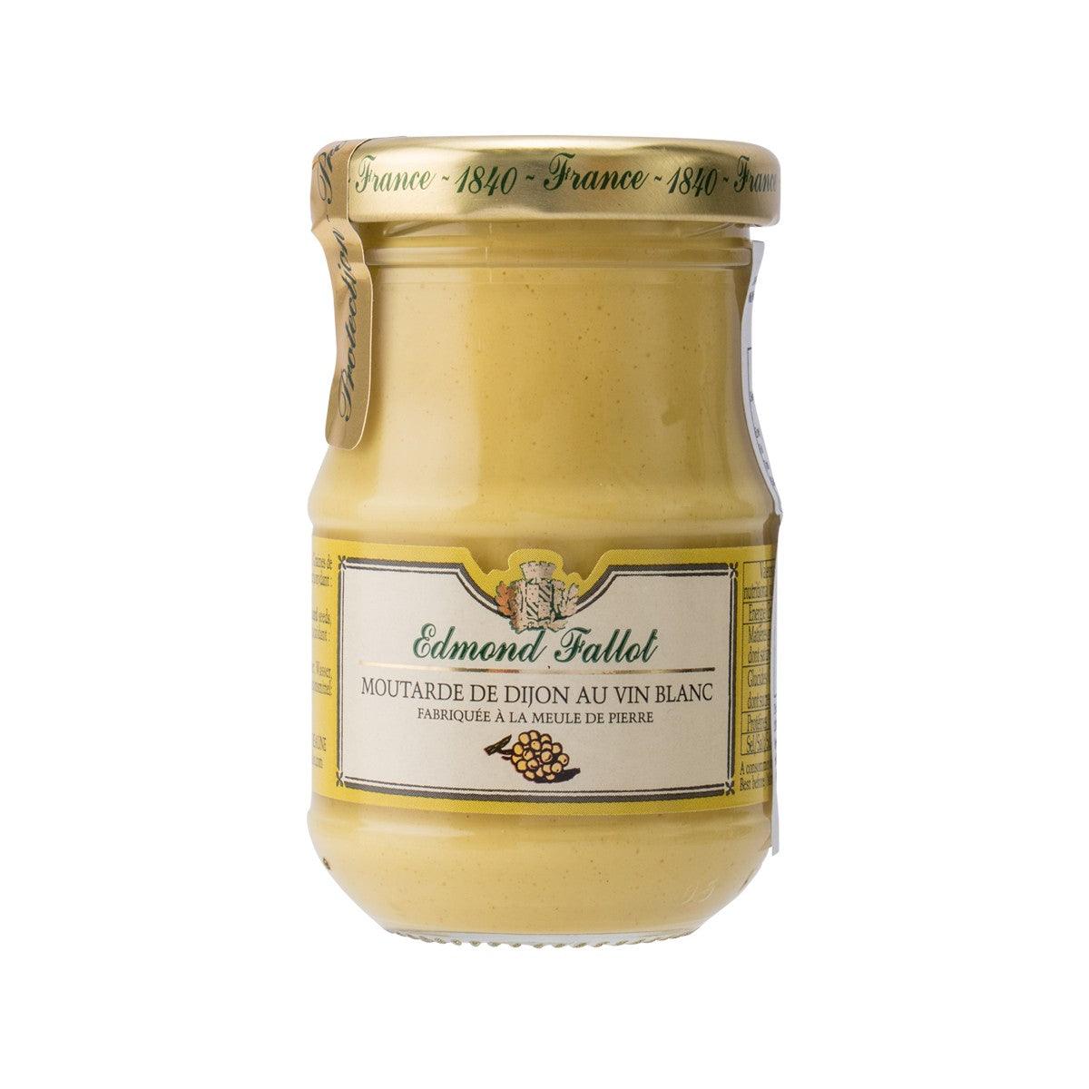 Dijon mustard with white wine jar, golden yellow condiment in glass container