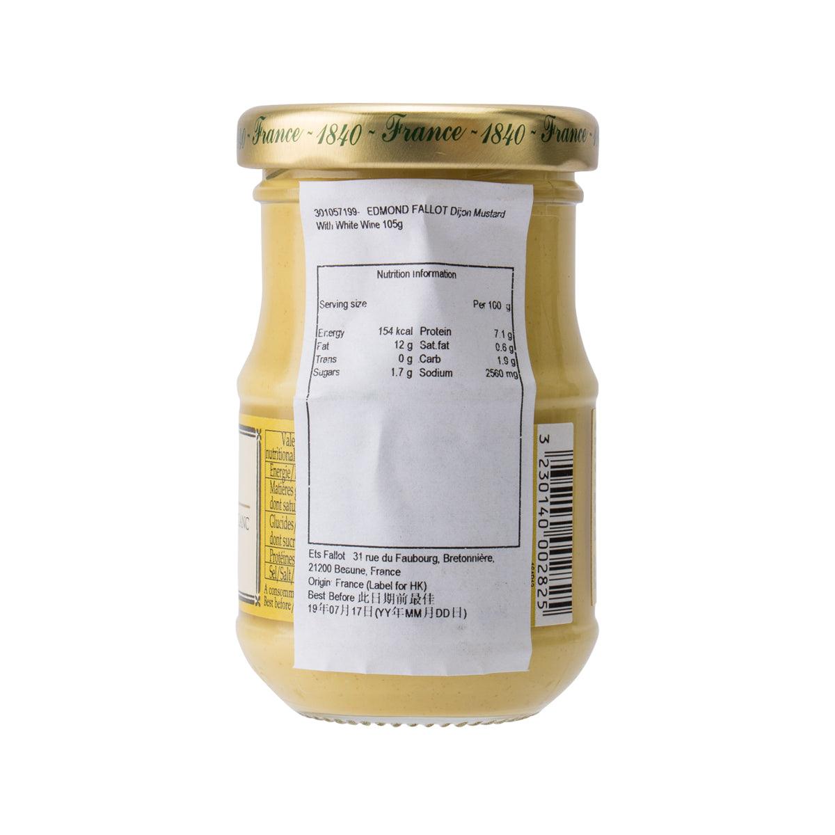 Dijon mustard with white wine, nutrition label on golden glass jar