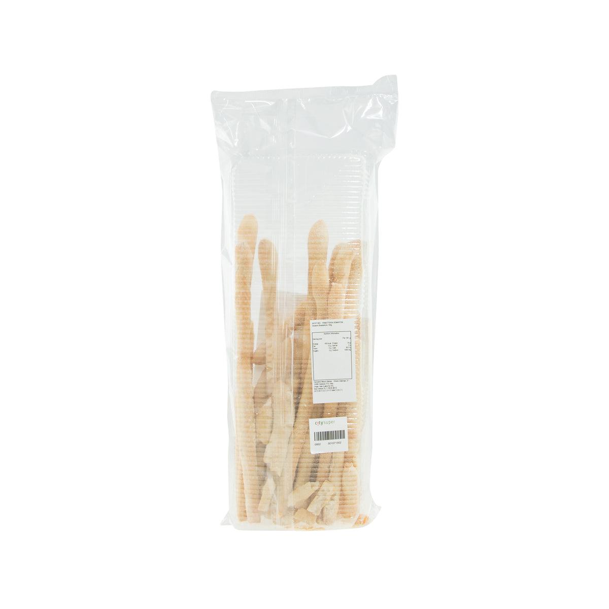 Back view of sesame breadsticks in clear plastic bag with barcode label