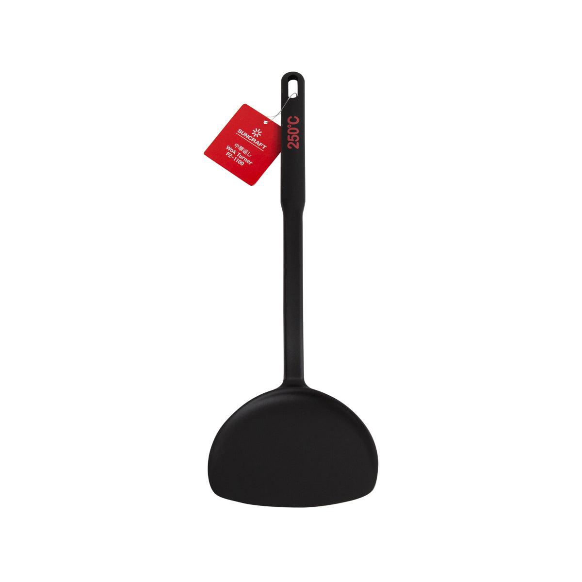 Black Chinese turner spatula with round head and hanging loop handle
